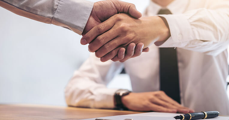 hand shake with legal money lender in Singapore